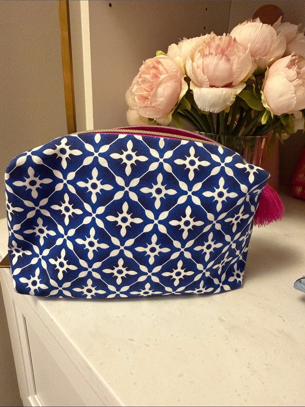 Estee Lauder Blue and white reversible  recycled cosmetic pouch Pink Tassel